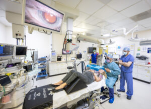 Ophthalmologists performing surgery