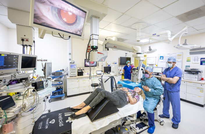Ophthalmologists performing surgery
